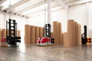 A rendering of automated forklifts working in a warehouse